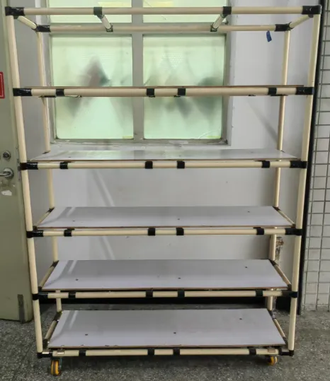 Empty wheeled five-level rack shown in the factory’s material-handling instructions