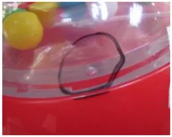 Bubble in a transparent molded part. The dark hand-drawn loop identifies a separate bubble example.