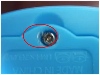 Damaged screw head. The circle identifies damage to the screw-head drive.