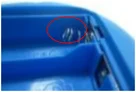 Deformed battery spring contact. The ellipse marks the deformed contact. Detail is limited by the small source photo.