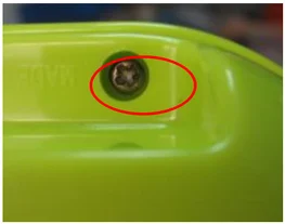Yellowed screw (plating defect). The source identifies the yellow appearance as a plating defect.