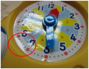 Lifting label. The marked area shows the label lifting from the product surface.