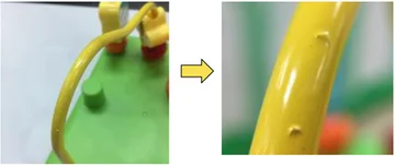 Surface that scratches the hand. The source places this example under hand scratching / injury. The arrow links the overall yellow part to the close-up of the raised irregularities.