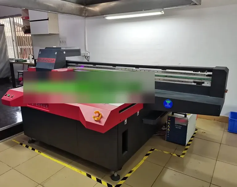 UV printing machine and its working bed