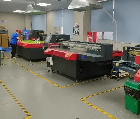 UV printing equipment in a marked workshop area