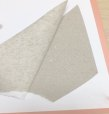 Small OK example from the workbook showing the book-cover lining after the adhesion check.