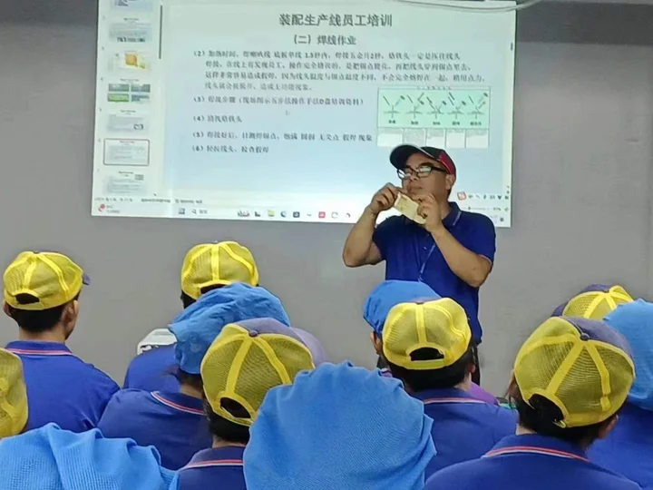 Production team learning session — photograph 4